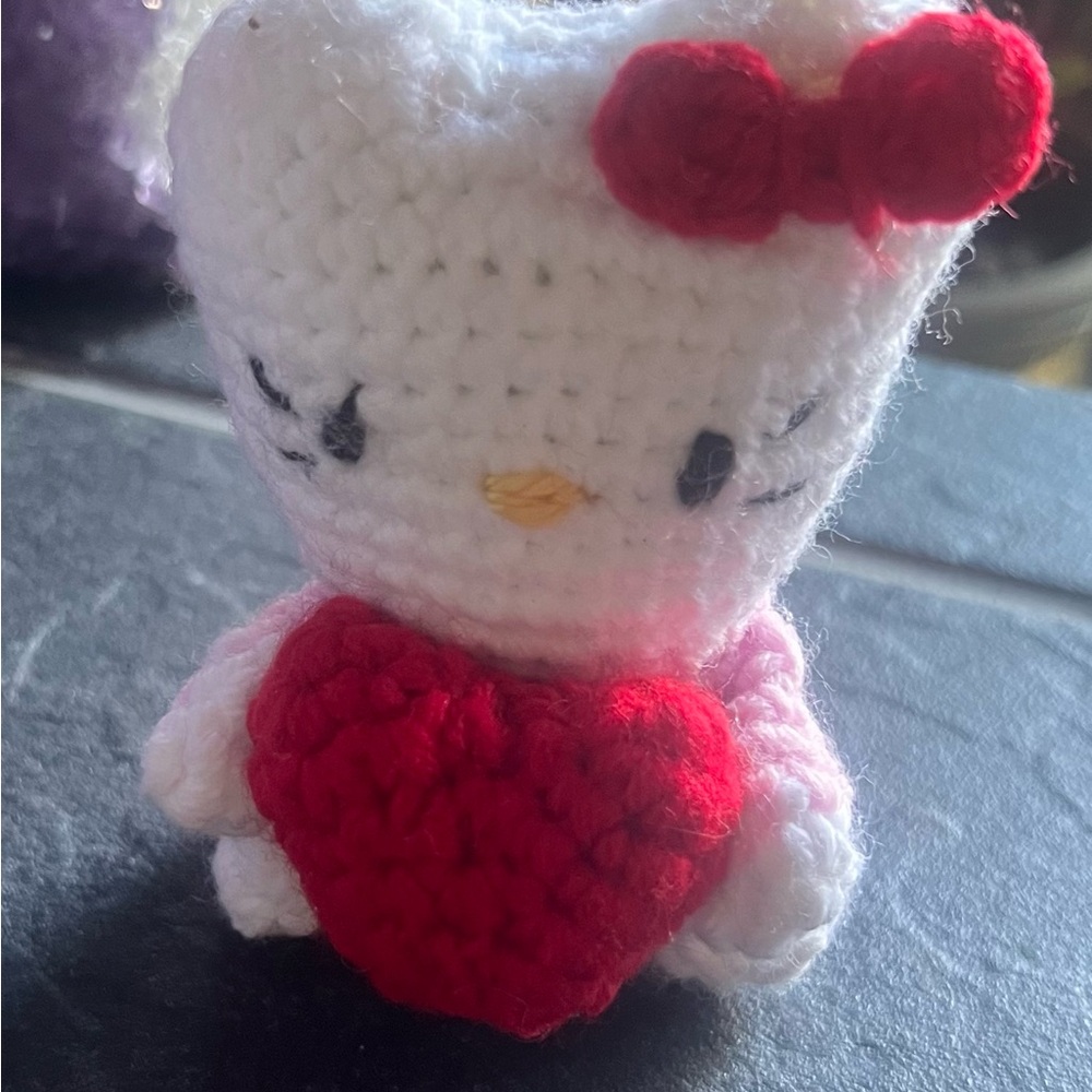 Crocheted White , pink and Red hello kitty.